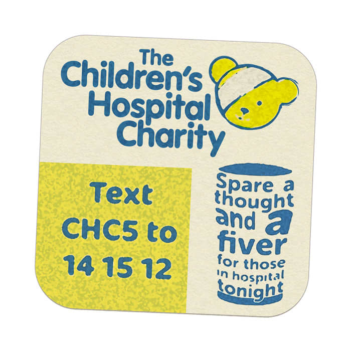 A square drink coaster featuring a bear illustration, with yellow and blue colours and a logo.