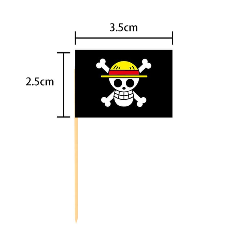 A toothpick flag with a black background featuring a skull and crossbones design in yellow and white, measuring 3.5cm by 2.5cm.