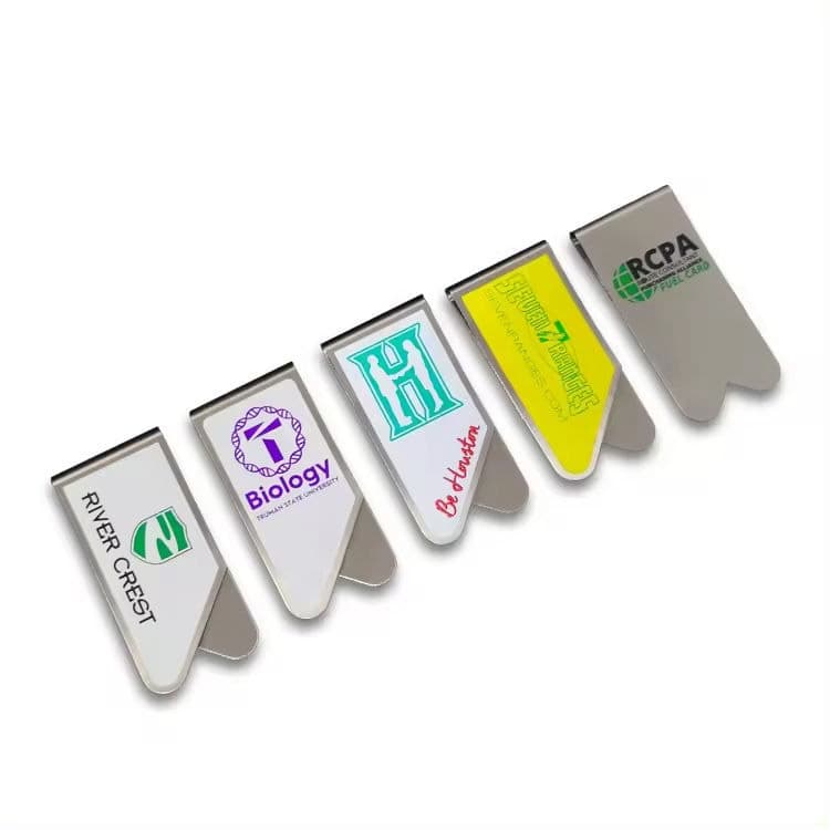 A collection of metallic custom business clips in various shapes and designs, featuring multiple colours and branding.