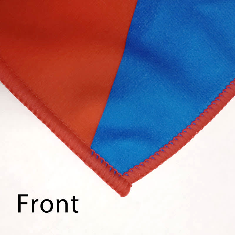 A close-up of custom polyester tea towels in vibrant red and blue with a stitched edge and a logo.