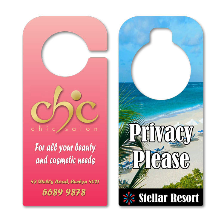 Two door hangers: one pink with gold logo and text for a salon, the other featuring a beach scene with a privacy message.