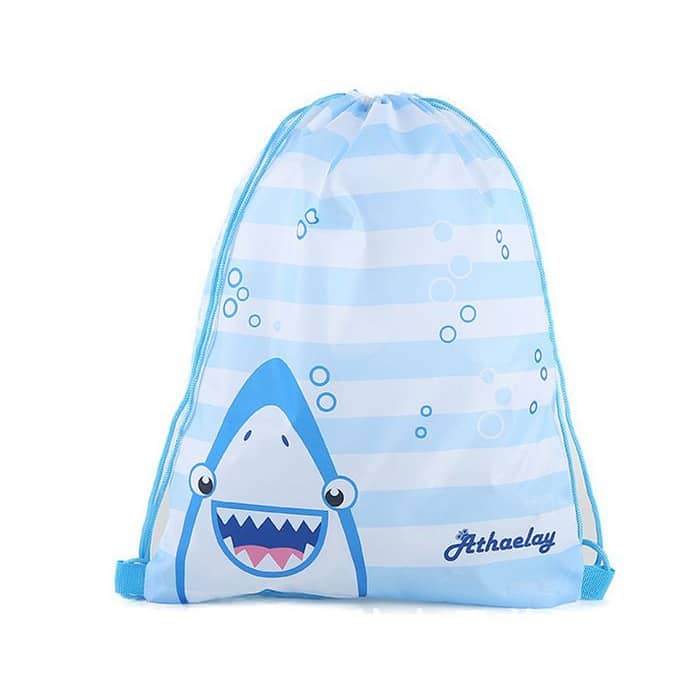 A large drawstring bag in light blue with a shark design and striped patterns, featuring a logo.