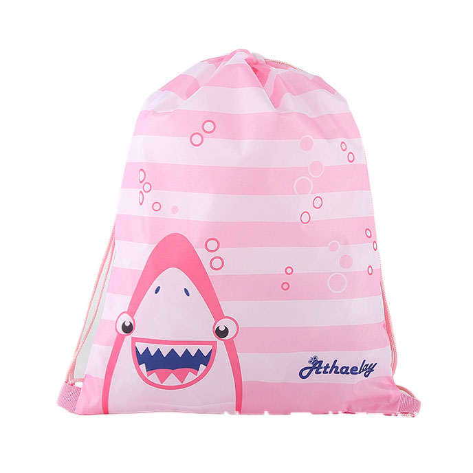A pink drawstring bag featuring a shark design and striped patterns. It includes a logo on the front.