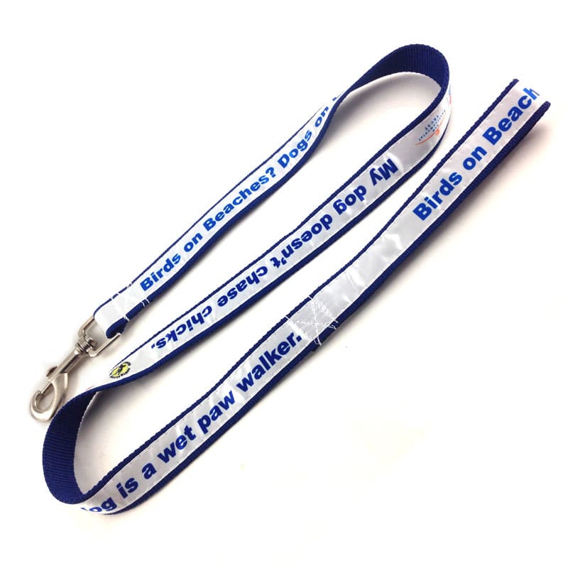 A dog leash in blue and white, featuring a logo and text along its length.