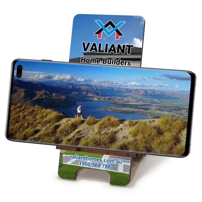 A full-colour Eco MDF phone holder with a scenic landscape design and a logo at the top.