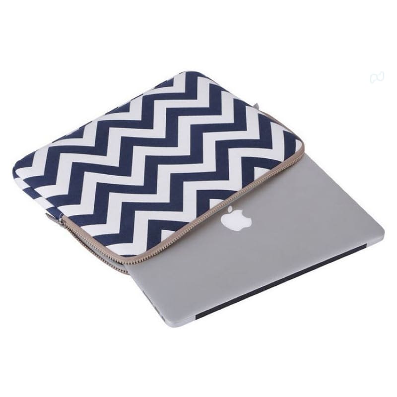 A neoprene laptop sleeve featuring a navy and white zigzag pattern, resting on a silver laptop. It has a zipper and a logo.