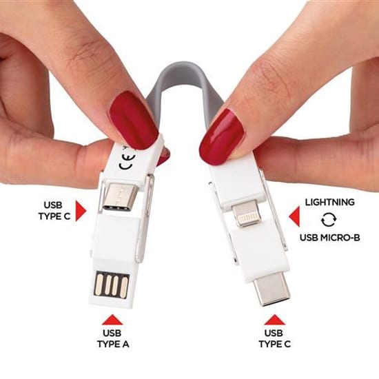 A 4 in 1 USB cable in white, featuring USB Type A, USB Type C, Lightning, and USB Micro-B connections.