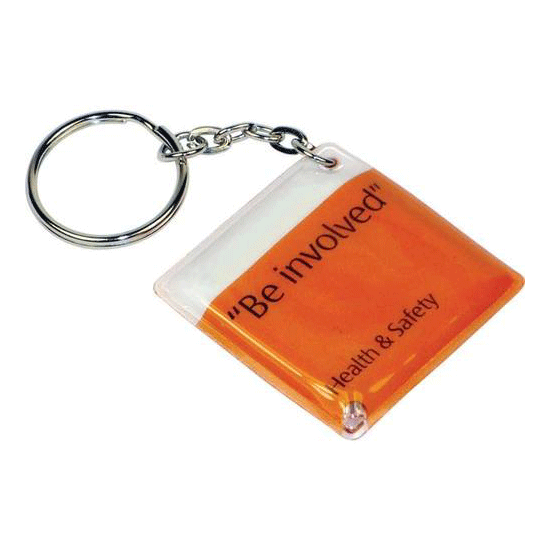 A PVC keyring with an LED light in orange, featuring a chain attachment and a logo.