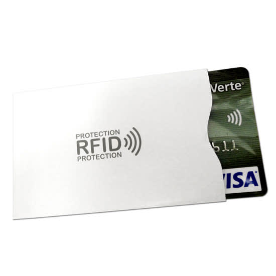 An RFID blocker pouch in white, holding a dark card with a logo on it.