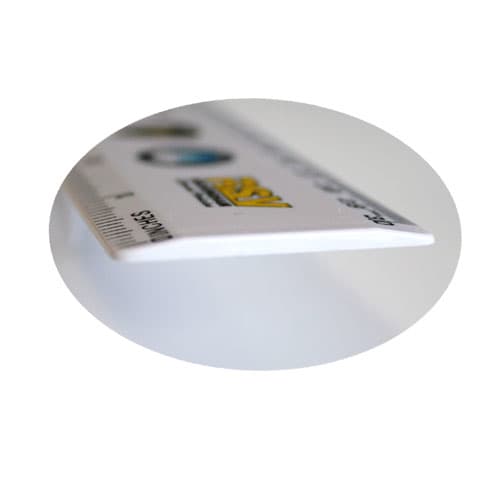 A 30cm molded ruler in white with a logo, featuring measurement markings along one edge.
