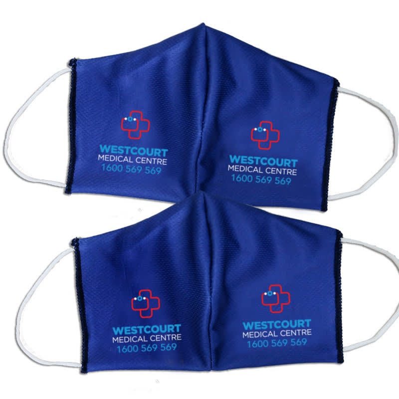 Two blue 2-ply fabric face masks with elastic ear loops and logos on the front.