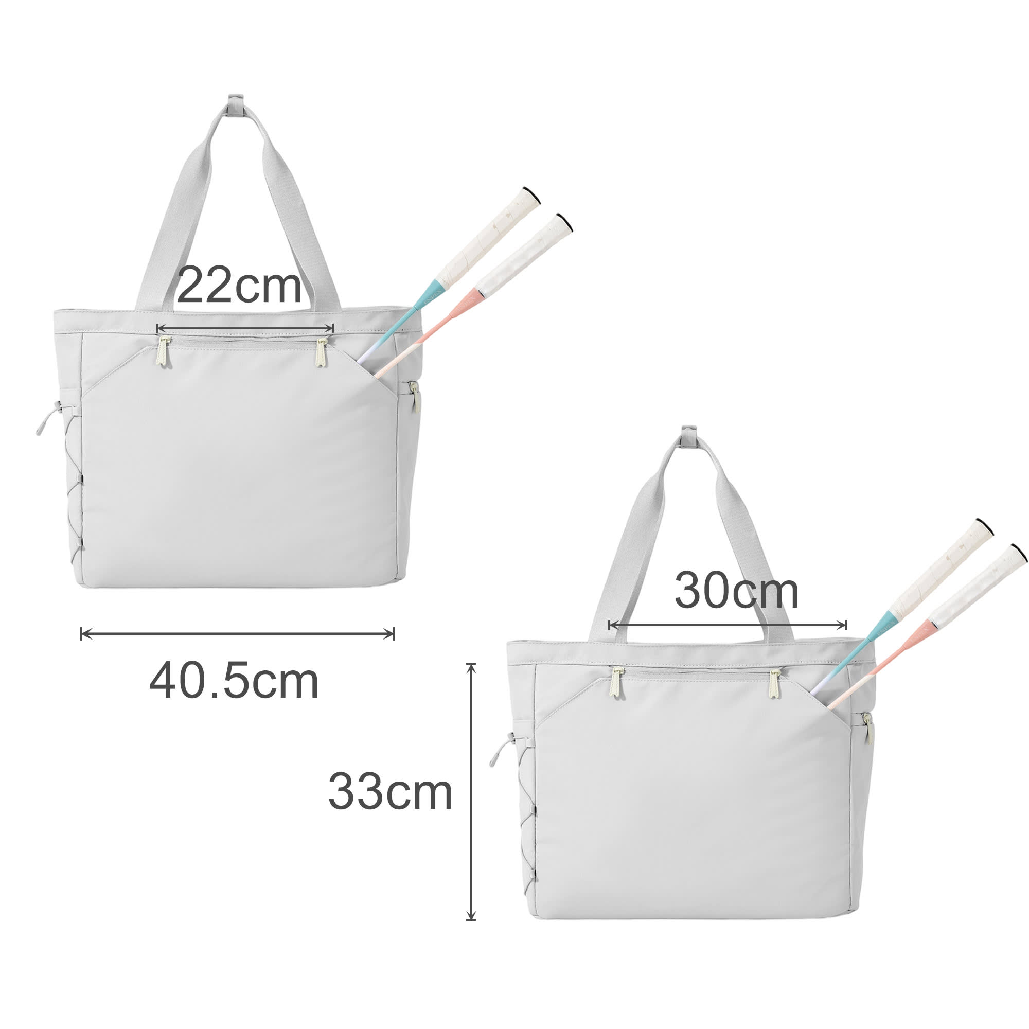 A lightweight grey tennis tote bag displayed with adjustable handles and two tennis racquets partially inserted.