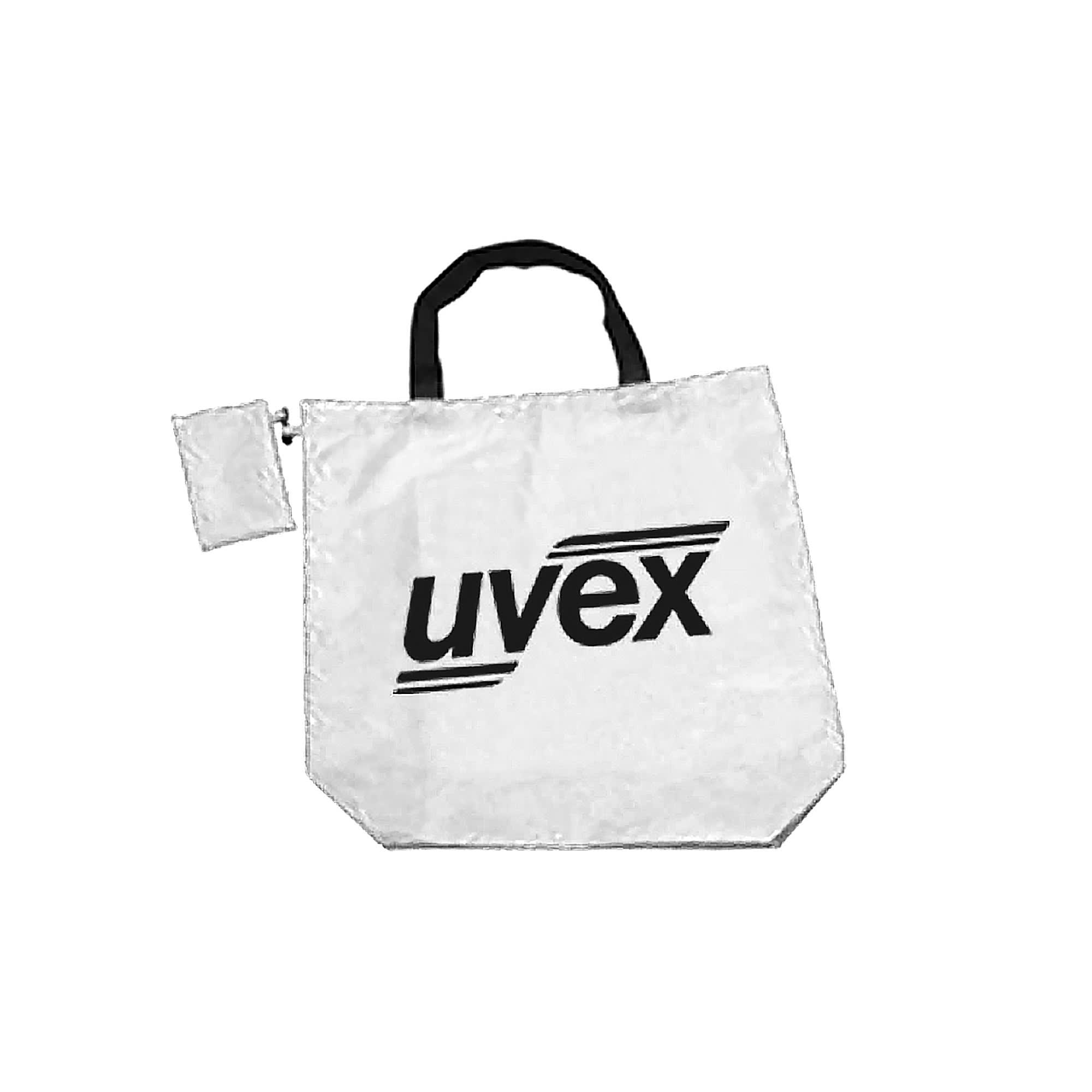 A white foldaway shopping bag with black handles and a small clip-on pouch, featuring a logo.