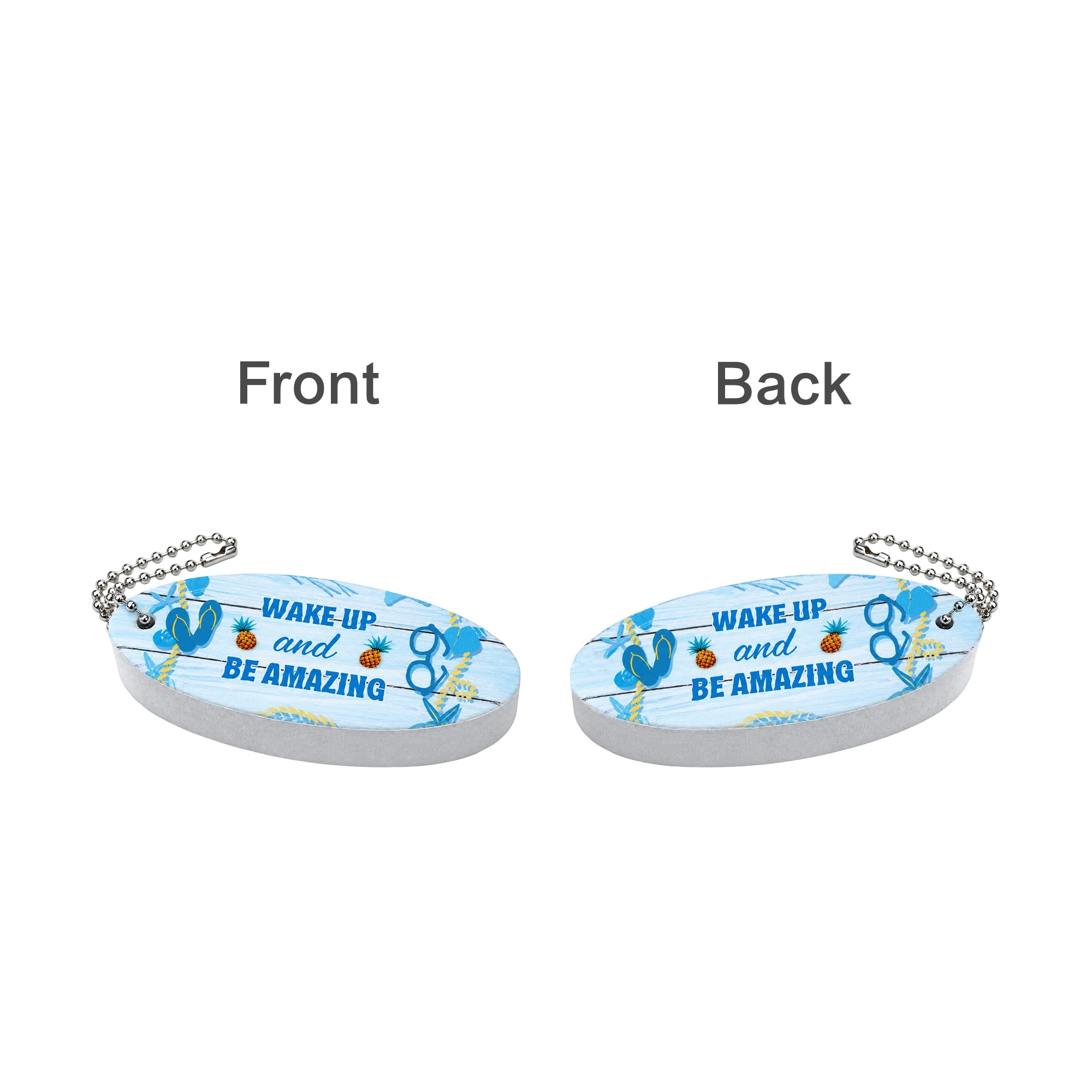 A blue oval keychain features tropical designs with a silver chain. Both sides display the same motivational text and graphics.
