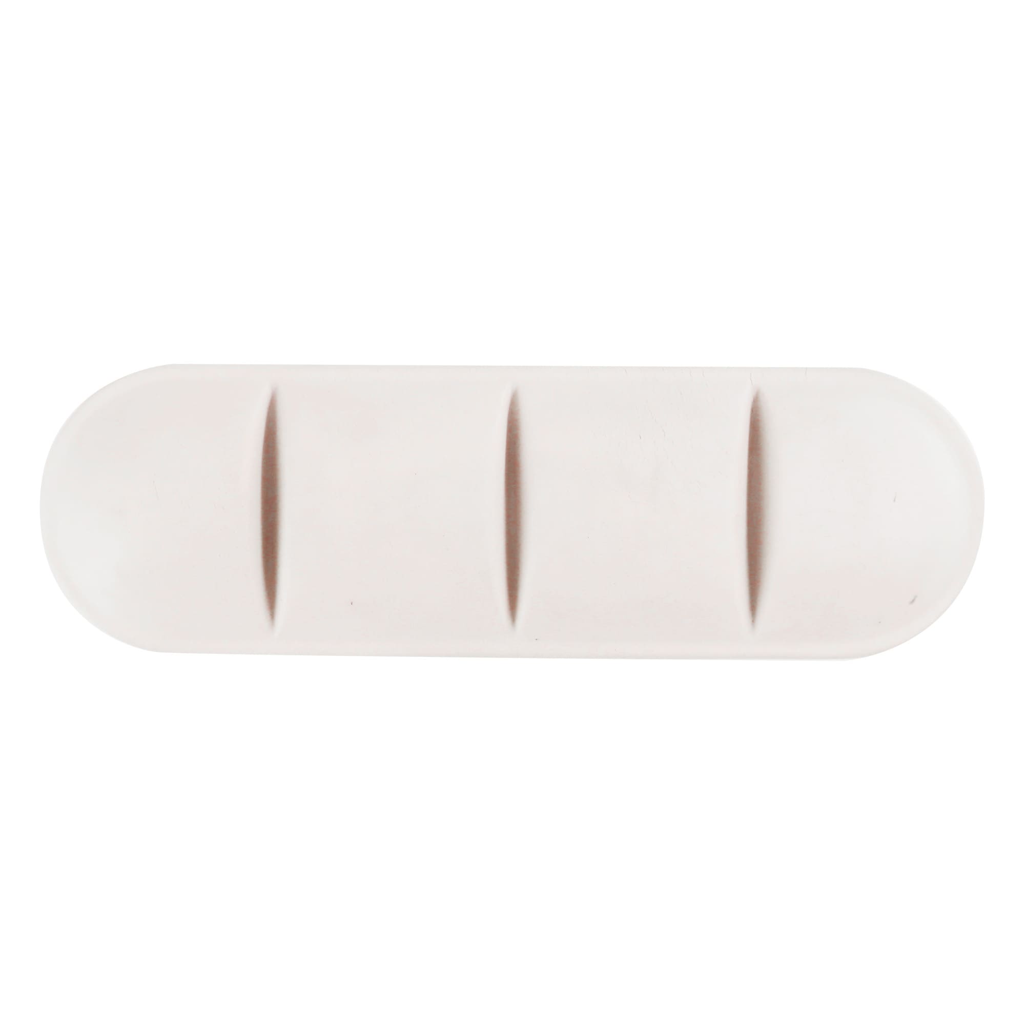 A large tablet-shaped stress reliever in a soft white colour, featuring three indented sections and a branding logo.