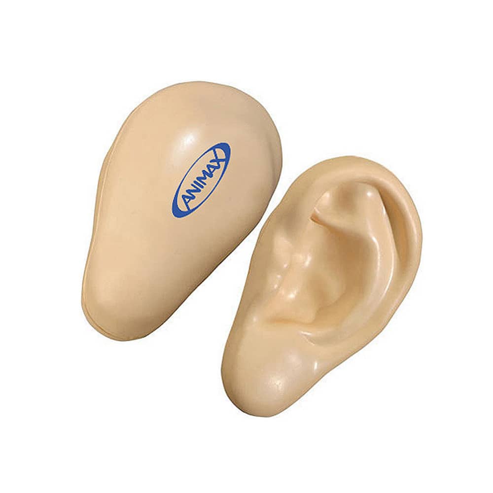 An ear-shaped stress reliever in a beige colour, featuring a logo on its surface.