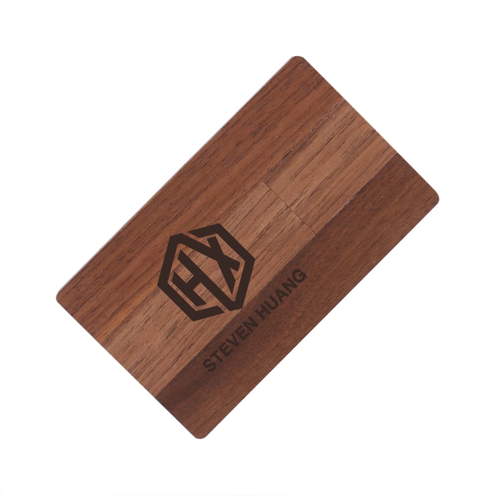 A wooden flash drive in brown tones featuring a logo on one side.