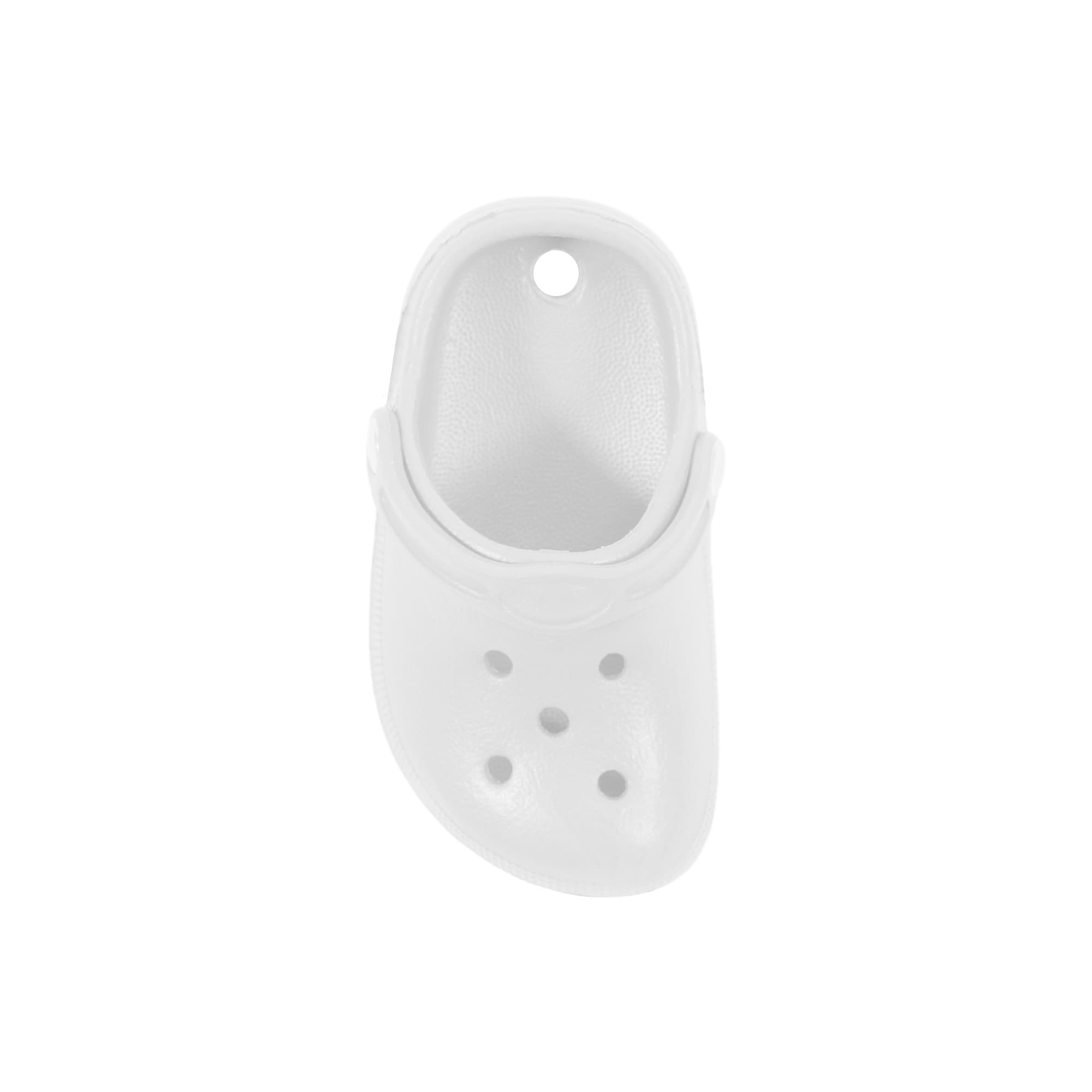 A white clog shoe-shaped charm with ventilation holes and a hanging hole at the top.