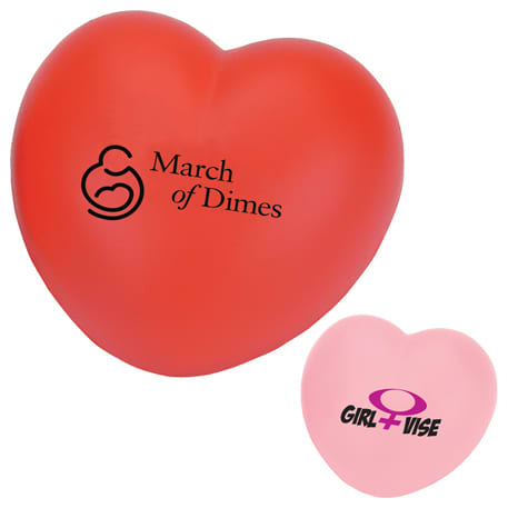 A red heart-shaped stress reliever with a logo, alongside a pink heart-shaped stress reliever.