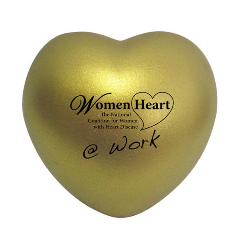 A gold heart-shaped stress reliever with branding on the surface.