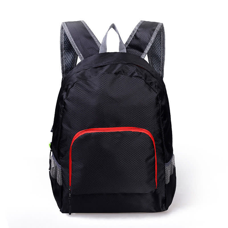A black backpack with grey straps and a red front pocket, featuring mesh detailing and a logo.