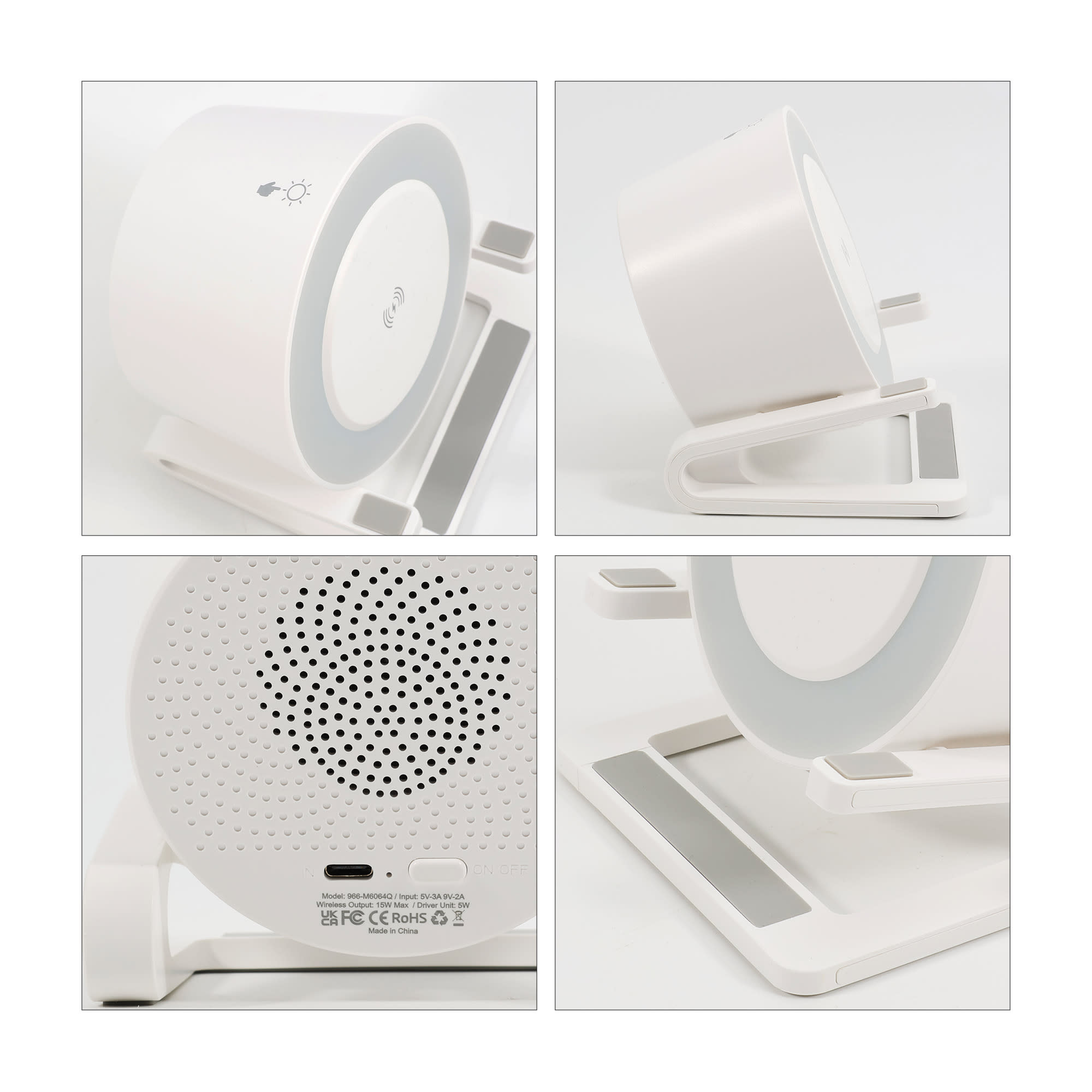 A white night light speaker with a wireless charging stand, featuring a circular design and a logo on the base.