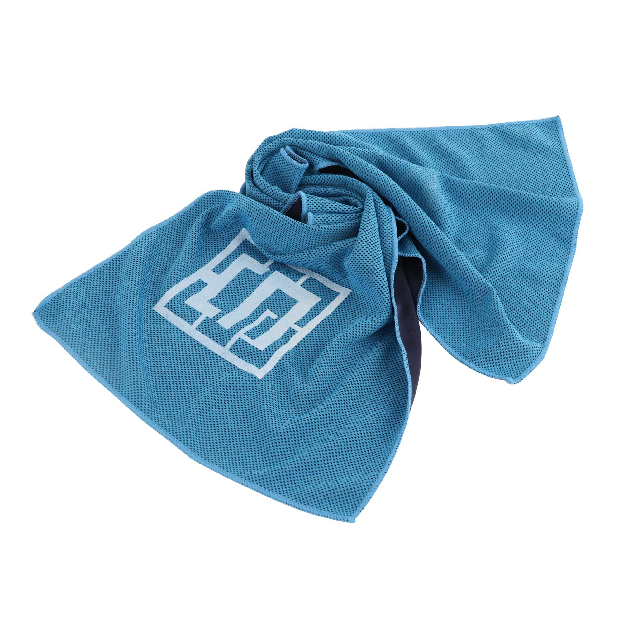 A blue cooling towel with a textured surface, featuring a logo in the centre.