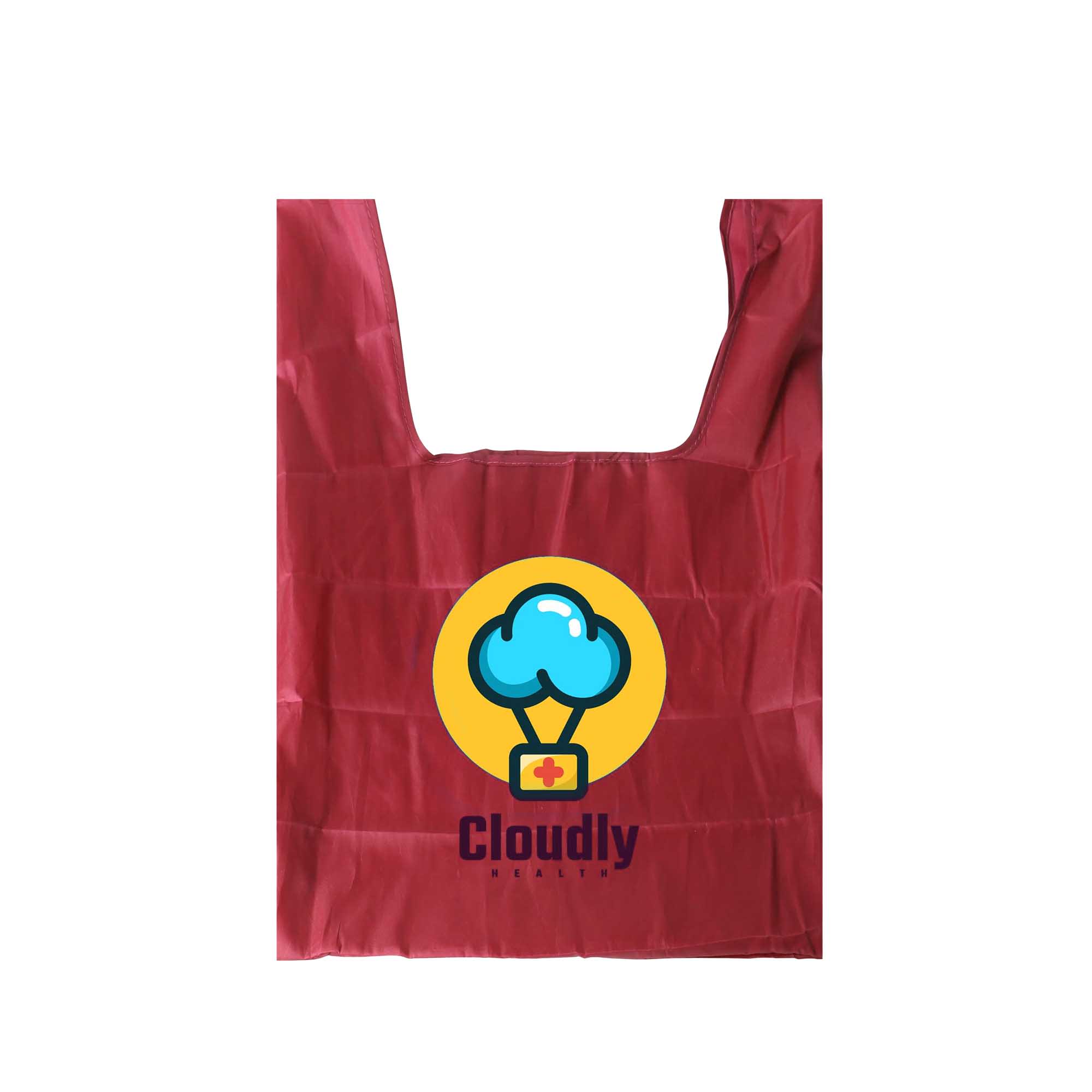 A maroon reusable foldaway shopping bag featuring a central logo with a cloud and a medical symbol.
