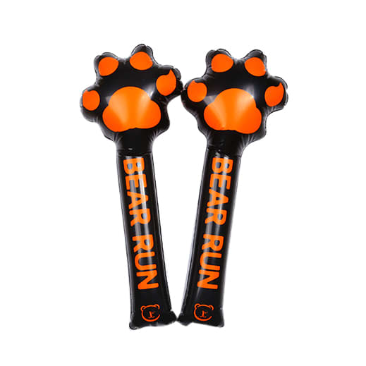 Two inflatable bang bang sticks in black and orange with paw print designs and branding.