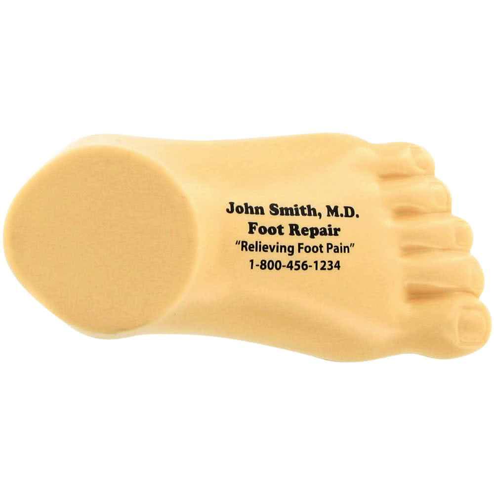 A tan foot-shaped stress reliever with a smooth surface and a logo on one side, ideal for stress relief.