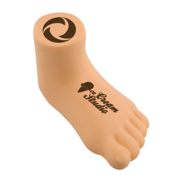 A beige leg-shaped stress reliever featuring a rounded top and a logo.