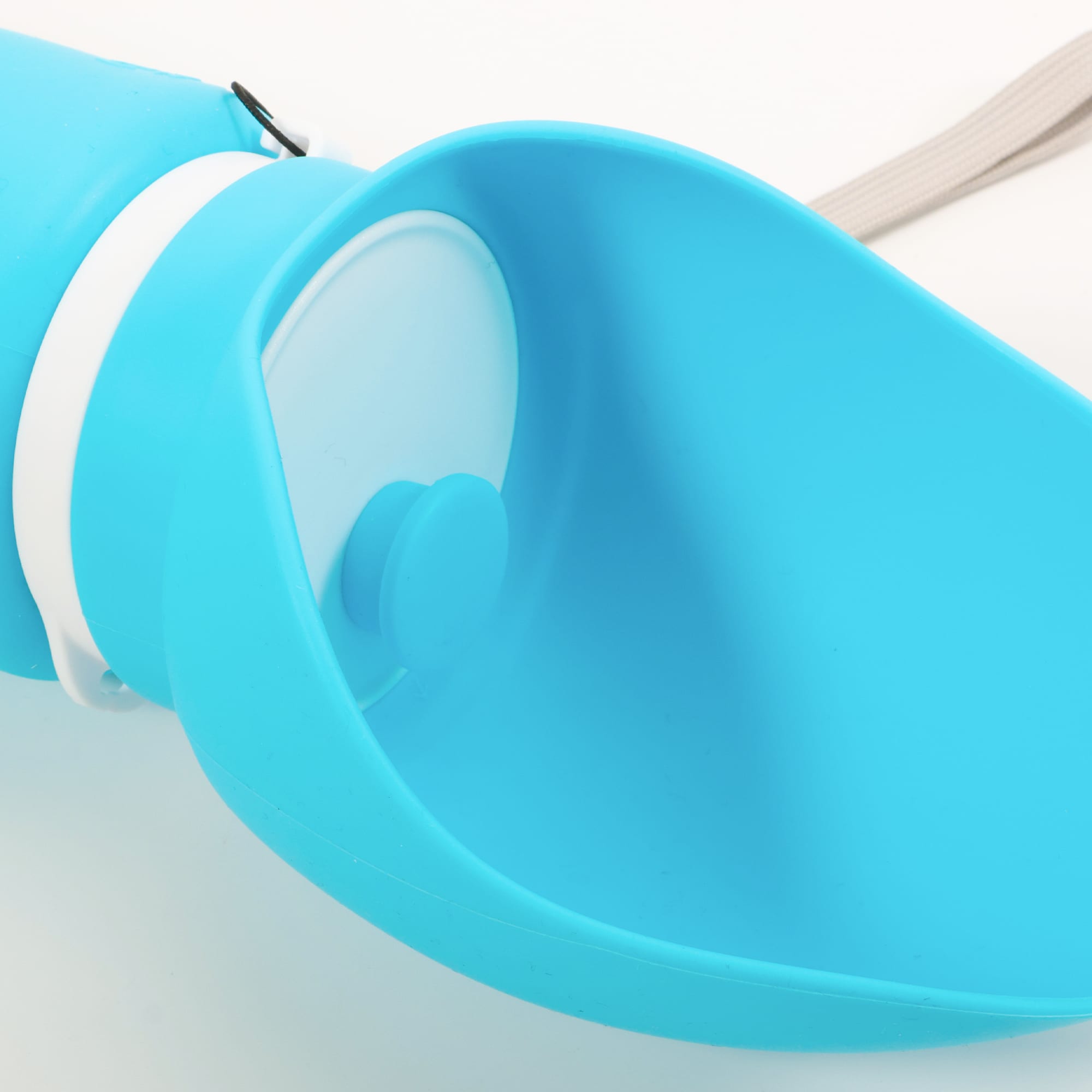 A drink bottle in bright blue features a collapsible bowl for easy access to water. Includes a strap and branding.