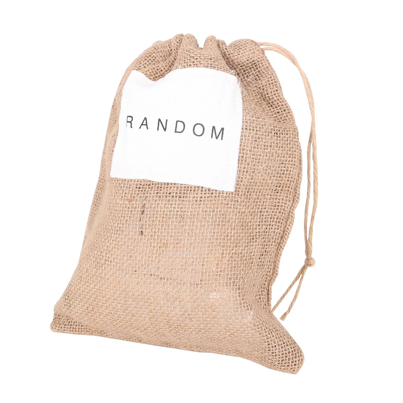 A jute net produce bag in a natural tan colour with a white label featuring text, and a drawstring closure.