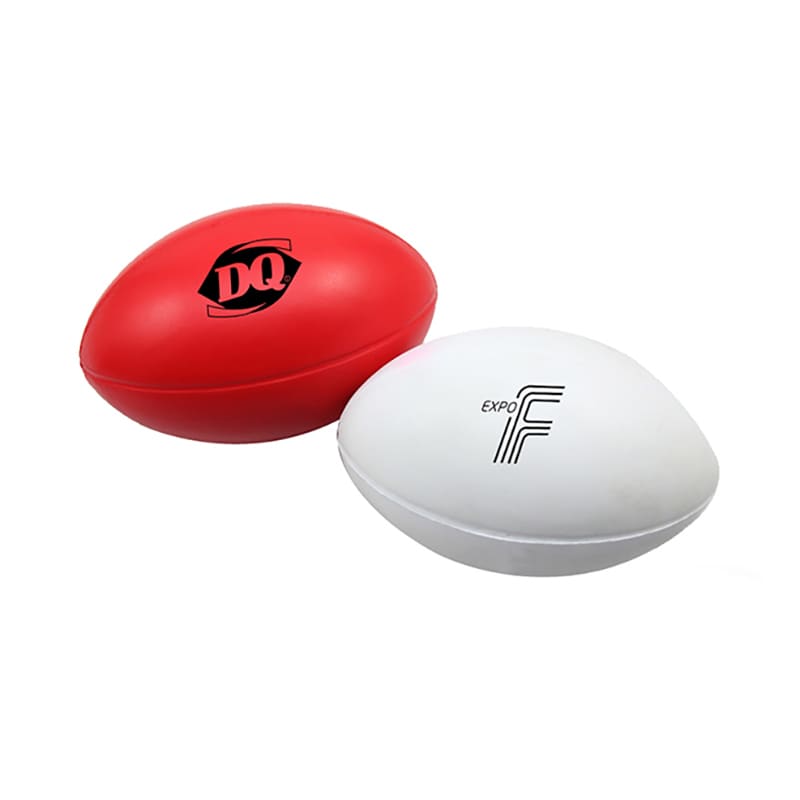 A red and a white stress ball in the shape of a rugby ball, featuring logos on both.
