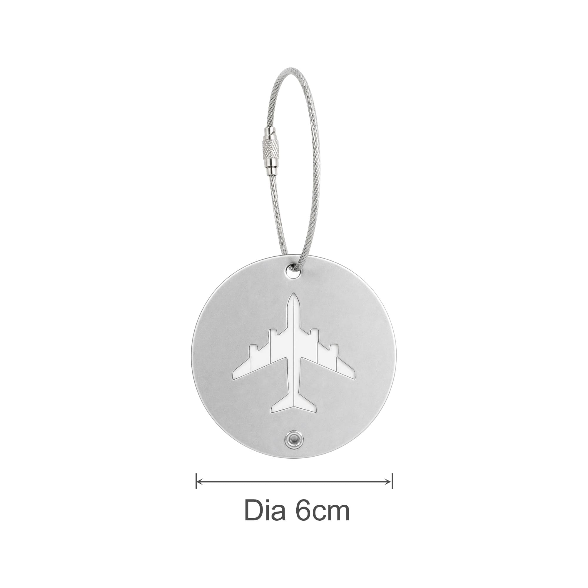 A circular silver luggage tag featuring a cut-out airplane design, attached with a wire cable.