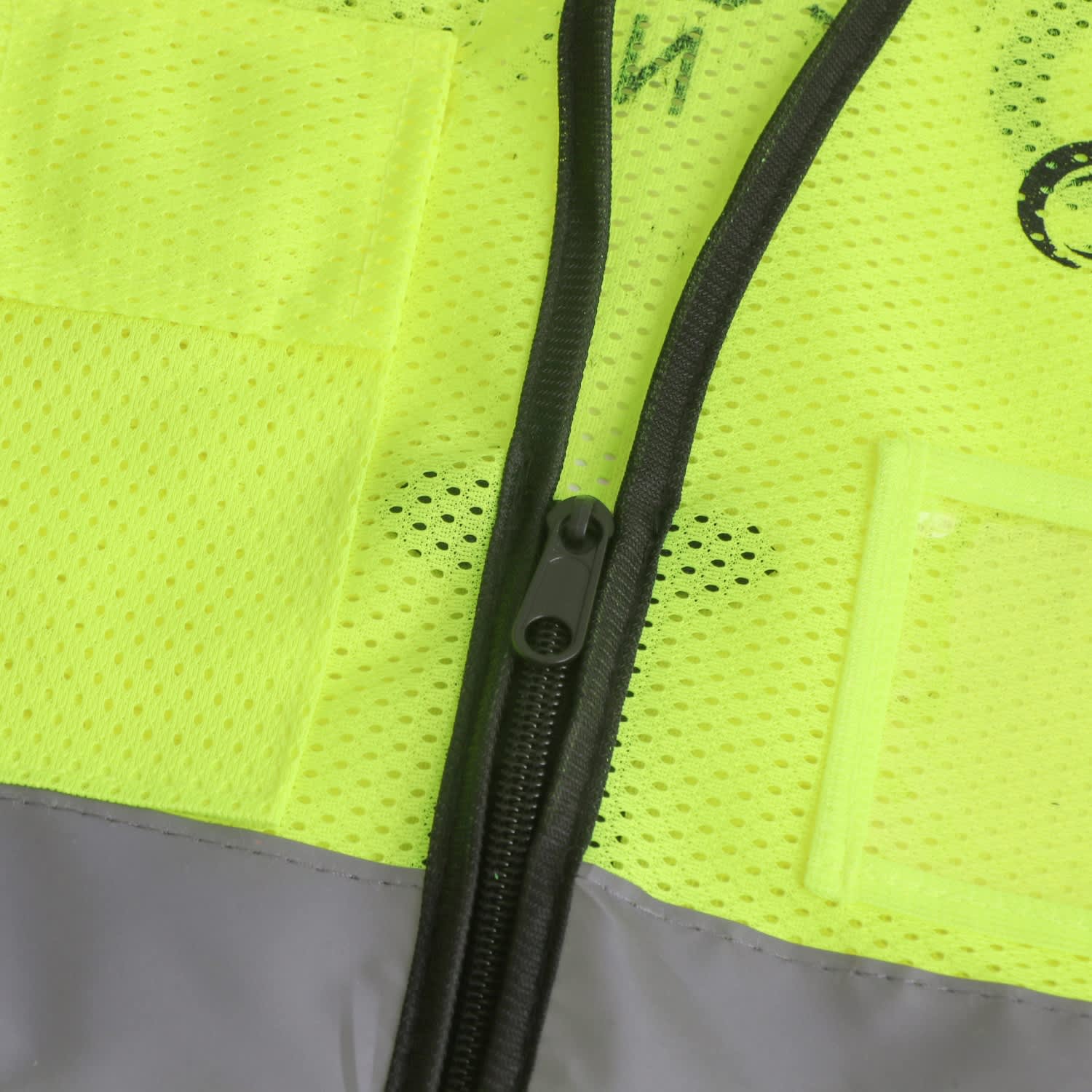 A high-visibility yellow unisex vest featuring reflective tapes and functional pockets, with a zippered front.