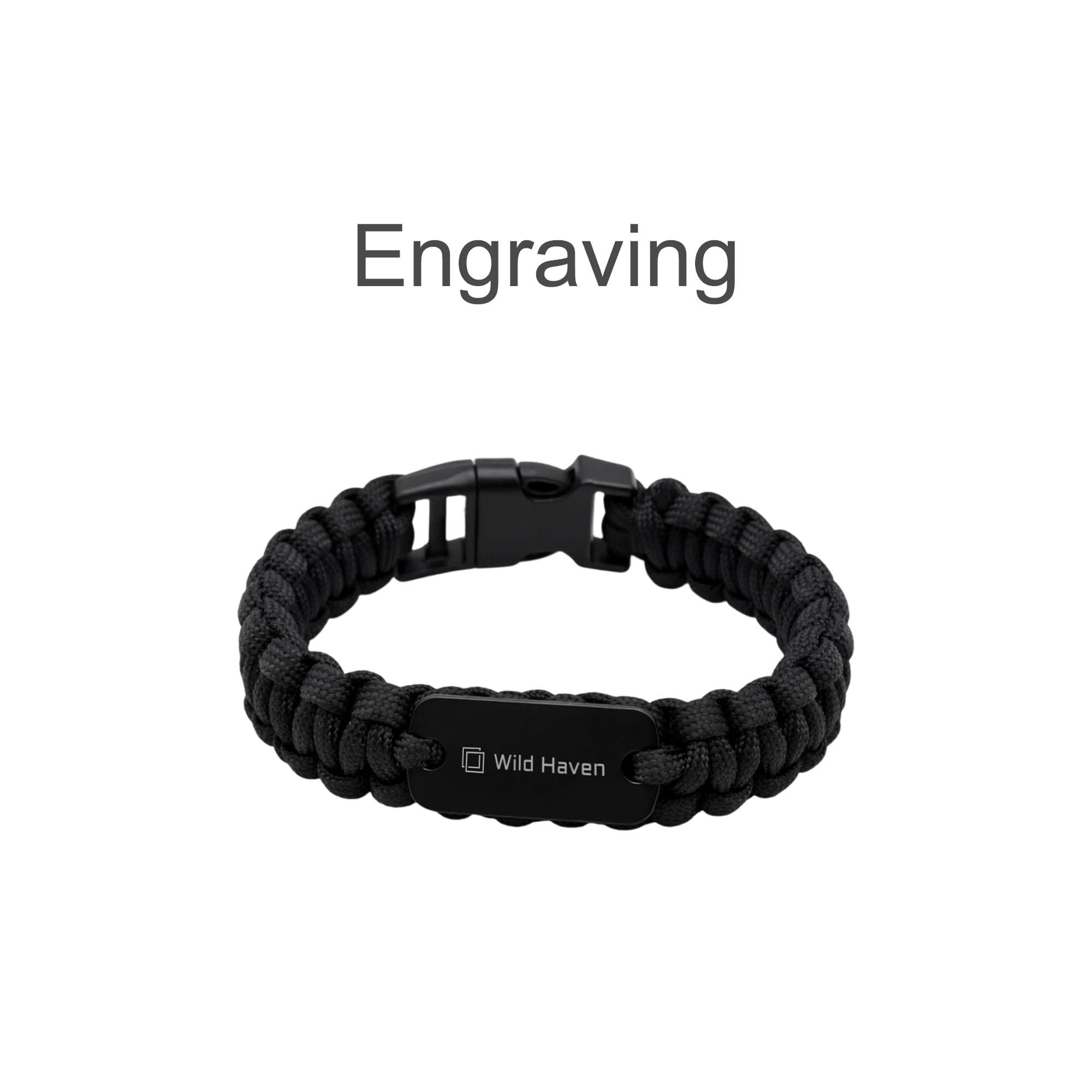 A black paracord bracelet featuring a metal plate and a clasp, suitable for custom engraving.