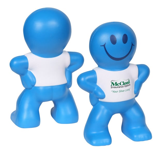 A blue stress reliever in the shape of a smiling cartoon figure with a white shirt featuring a logo.