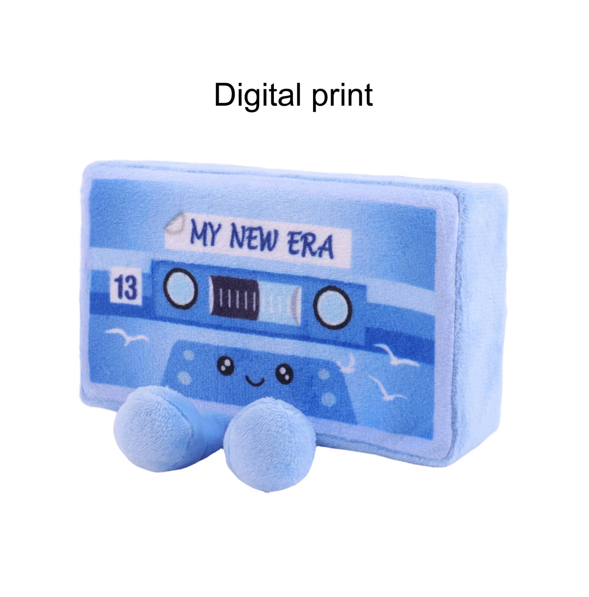 A blue block plush toy with a smiling face and a digital print design featuring a cassette tape motif.