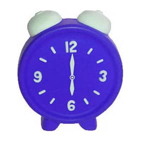 A purple alarm clock-shaped stress reliever featuring white alarm bells and black hour markers. Includes a logo.
