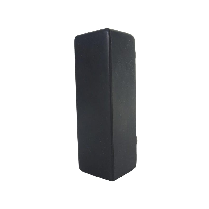 A black, rectangular stress reliever with a smooth surface and rounded edges. It features a logo.