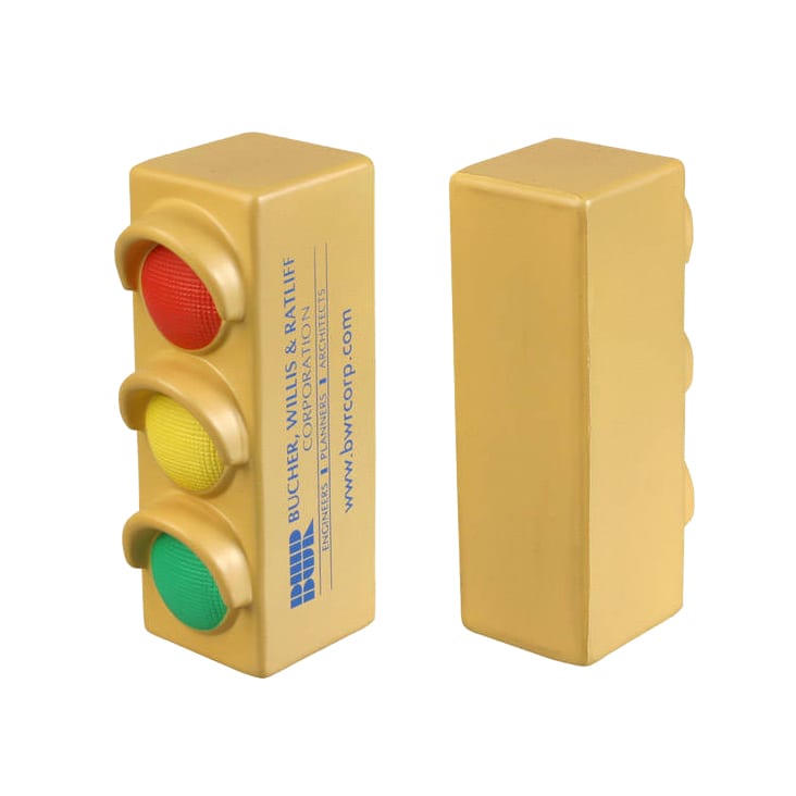 A traffic light-shaped stress reliever in gold, featuring red, yellow, and green buttons. Includes a logo.
