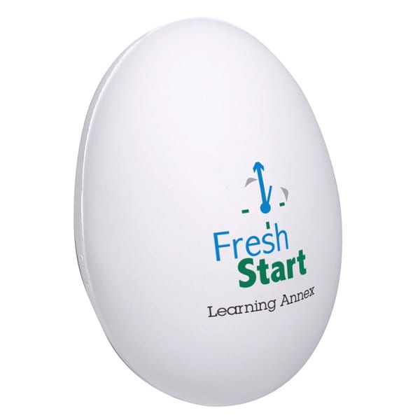 An egg-shaped stress reliever in white, featuring a logo and text on one side.