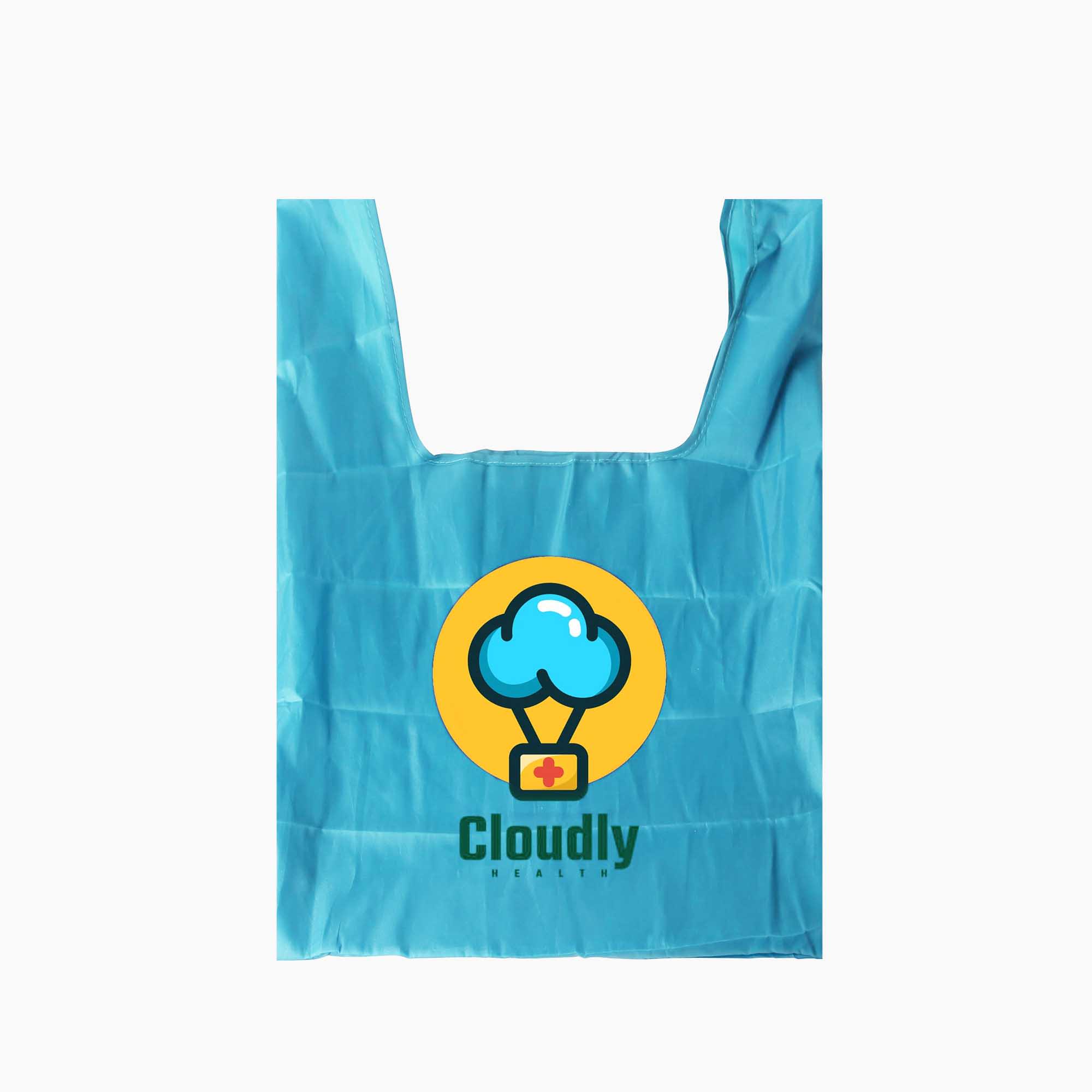 A turquoise reusable foldaway shopping bag featuring a round logo with a cloud and a small box underneath.