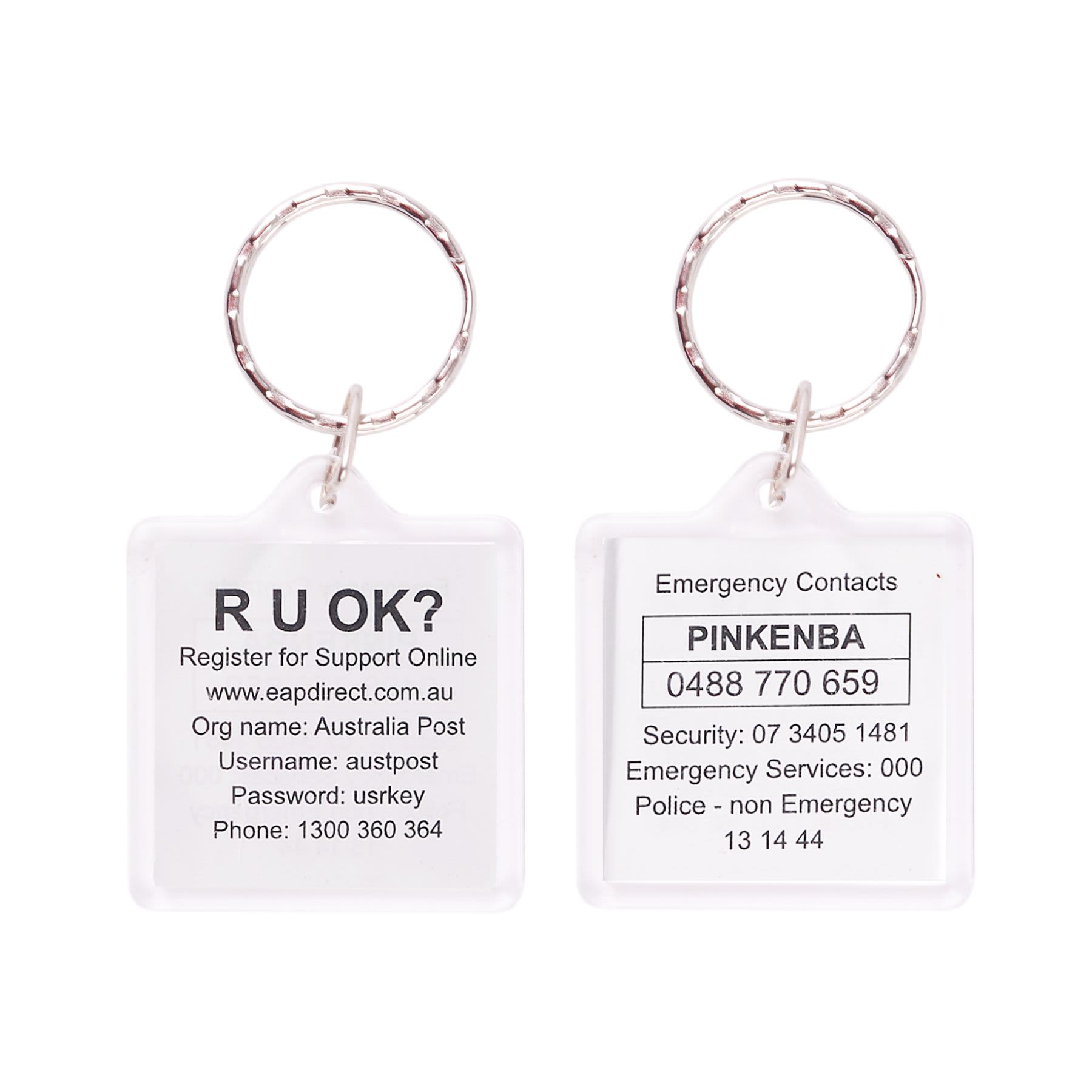 A square acrylic keyring in clear colour featuring emergency contact information on both sides.