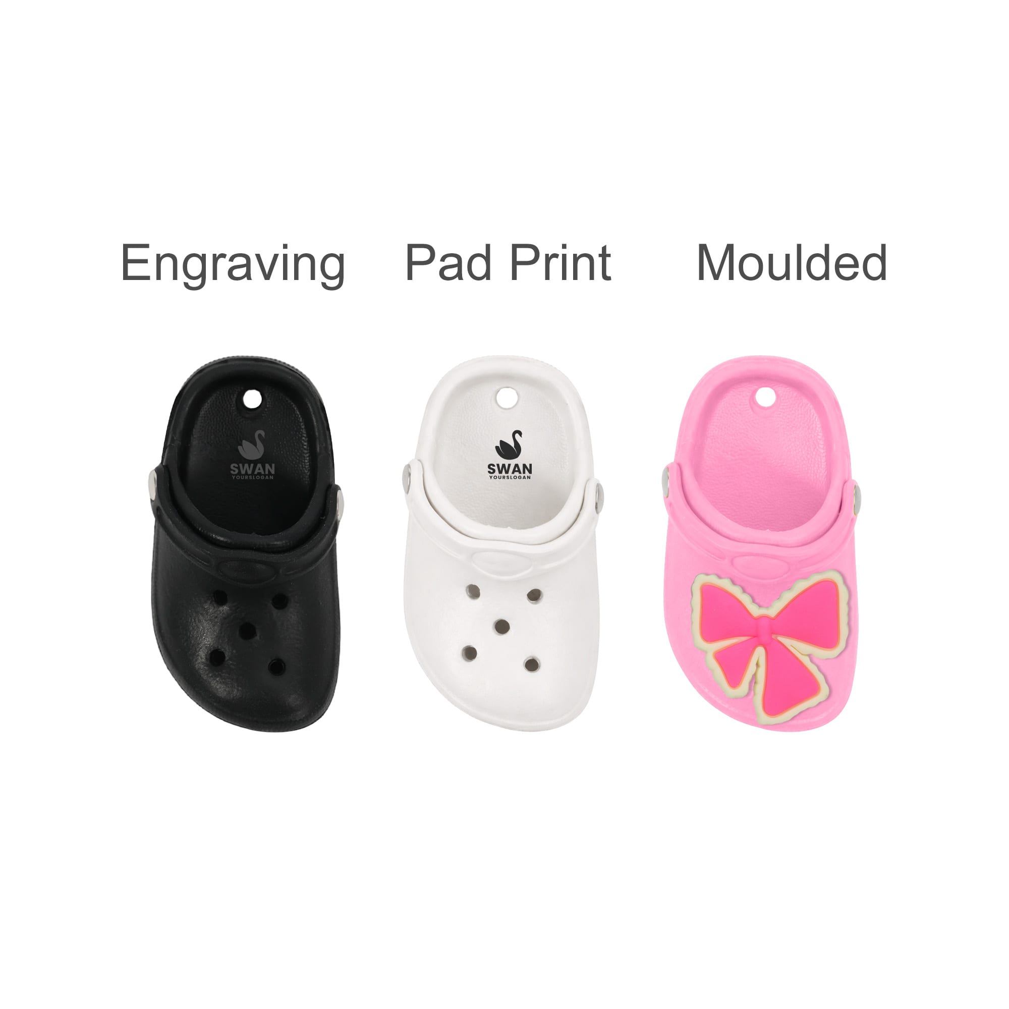 Three Clog Shoe fridge magnets in black, white, and pink with a decorative bow. Each has a branding logo.