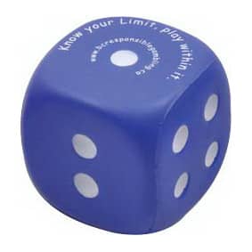 A blue cube-shaped stress reliever with white dots and a logo on top.