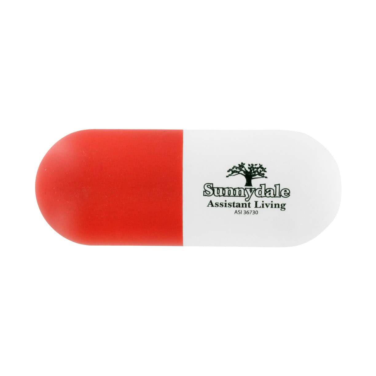 A capsule-shaped stress reliever in red and white, featuring a logo on the surface.