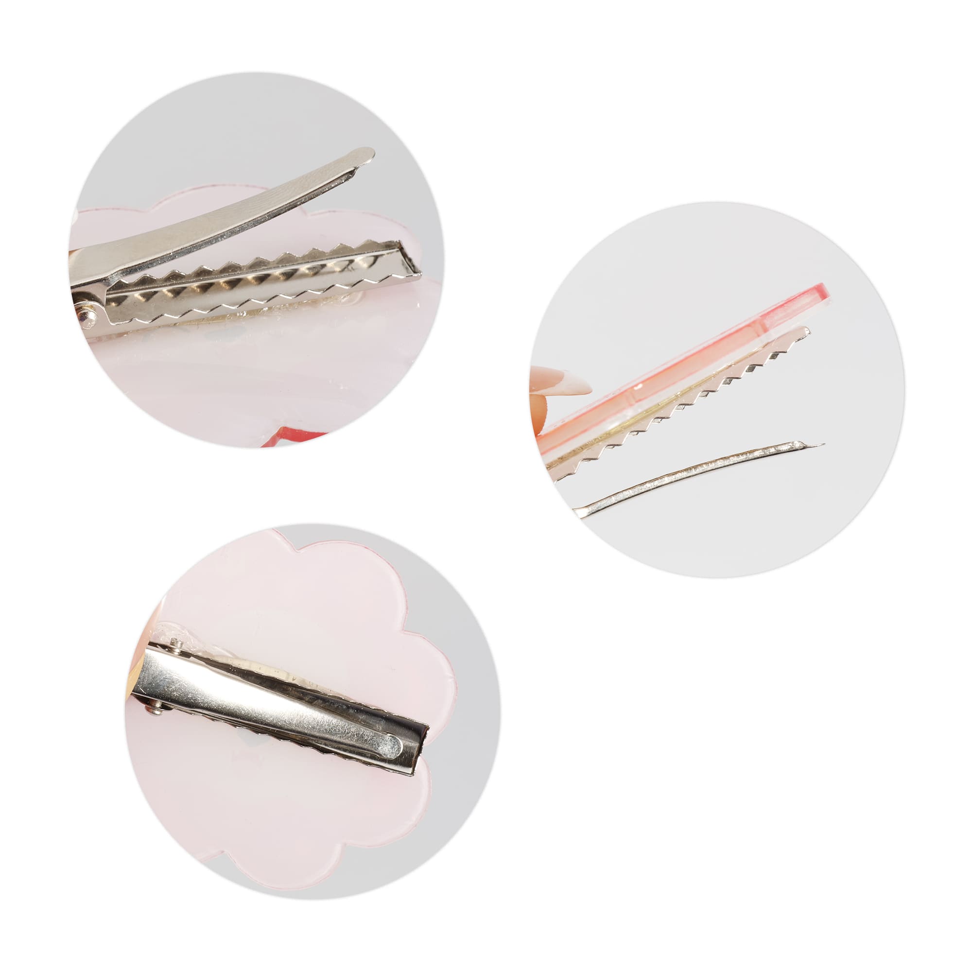 A pink custom shape acrylic hair clip with a metallic clasp, featuring a scalloped design and a logo.