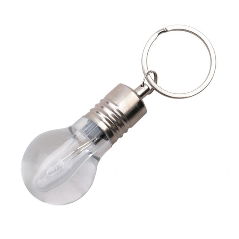 A light bulb-shaped flash drive in clear and silver, attached to a keyring. Features a simple design and a logo.